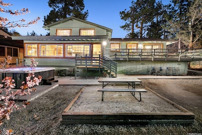 Expansive Lake View Home1 mile from the Village w/ Hot tub & Game Rm VRR20250487