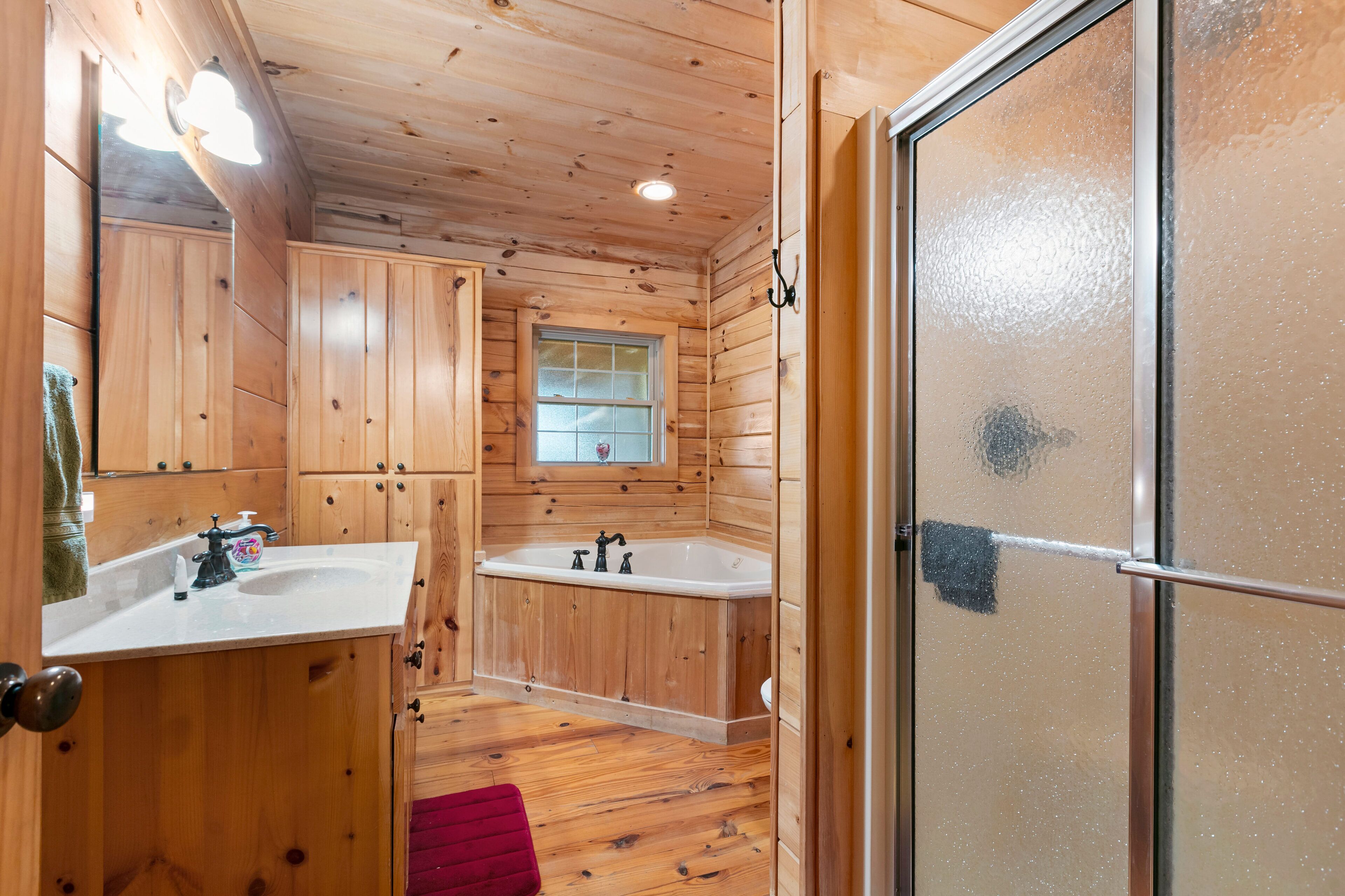 Combined shower/bathtub, hair dryer, towels, soap