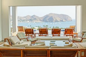 Open living room with breathtaking ocean  views!  