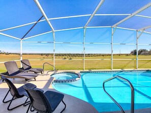 Outdoor pool, a heated pool, sun loungers
