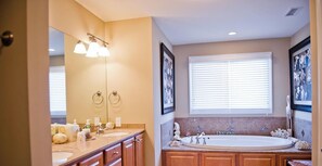 Combined shower/bathtub, jetted bath, hair dryer, towels