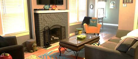 Smart TV, fireplace, books