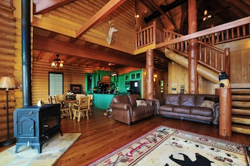 Large open real-- Log Cabin.  Feature large 75" TV with SONOS sound system.