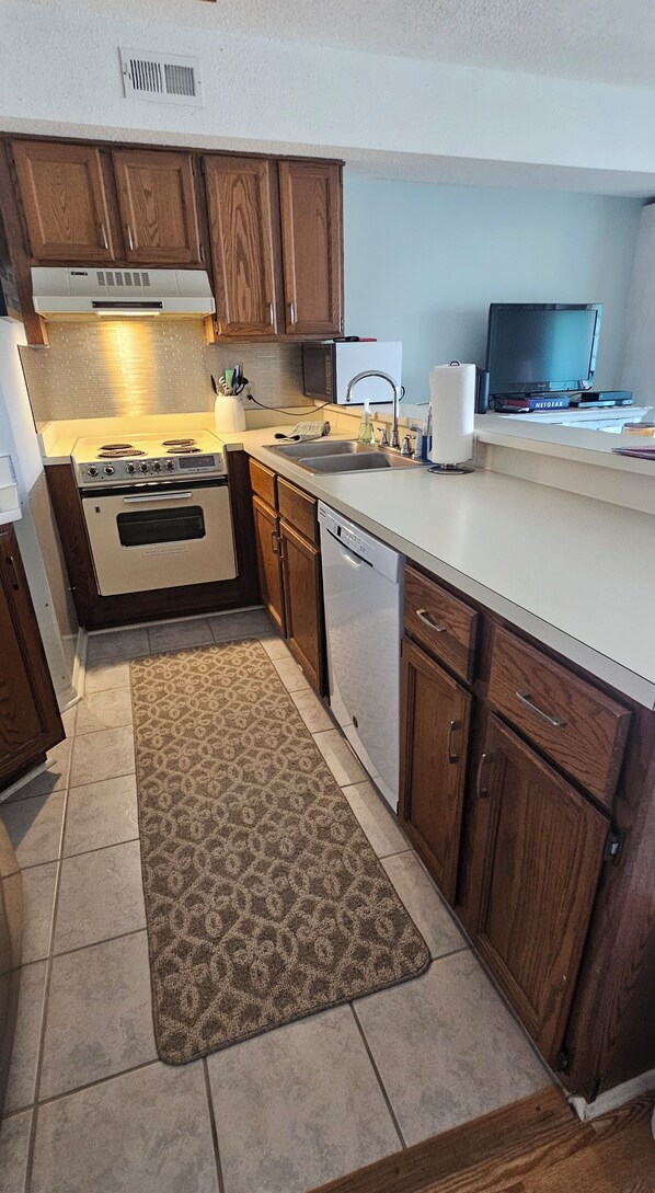 Fridge, microwave, oven, stovetop - 3rd-Floor Coastal Hideaway/1 bdrm condo w/Pool. Steps from Beach! (Carolina Beach)