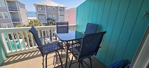 Outdoor dining - 3rd-Floor Coastal Hideaway/1 bdrm condo w/Pool. Steps from Beach! (Carolina Beach)
