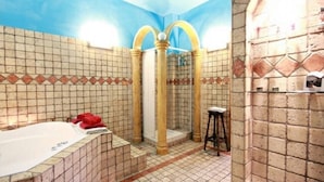 A bathroom with a bathtub, a shower area, and a tiled floor. - ❤Lovely Studio Near Trastevere Jacuzzi, WiFi, Aircon, patio Fully furn Kitchen (Rome)