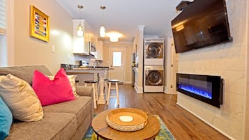 Smart TV, fireplace, books