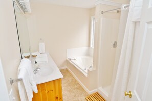 Combined shower/tub, hair dryer, towels, soap