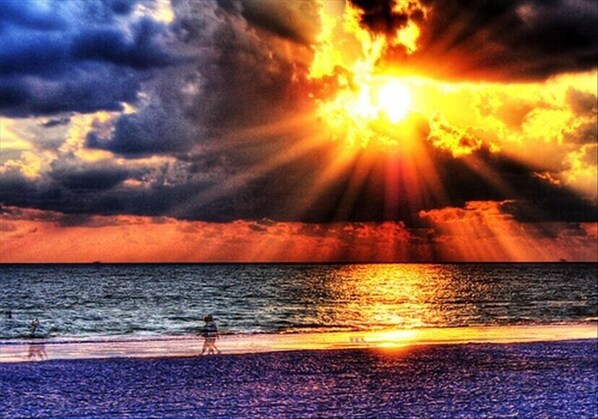 On the beach, sun-loungers, beach towels