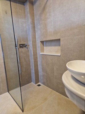 Bathtub, hair dryer, towels, soap