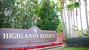 A sign for Highlands Reserve Golf Community with a brick base and a decorative border. - DISNEY AREA, Highlands Reserve SOUTH facing POOL, GAMES ROOM. SPECIALS AVAILABLE (Davenport)