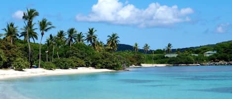 On the beach, sun loungers, beach towels
