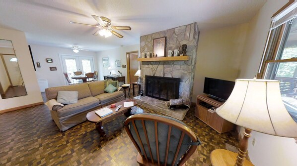 Smart TV, fireplace, DVD player, books