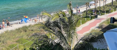 On the beach, sun loungers, beach umbrellas, beach towels