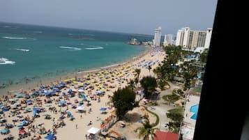 On the beach, sun-loungers, beach towels