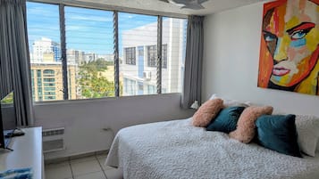 2 habitaciones, caja de seguridad en la habitación y escritorio