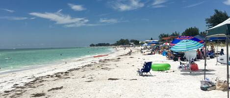On the beach, sun-loungers, beach towels