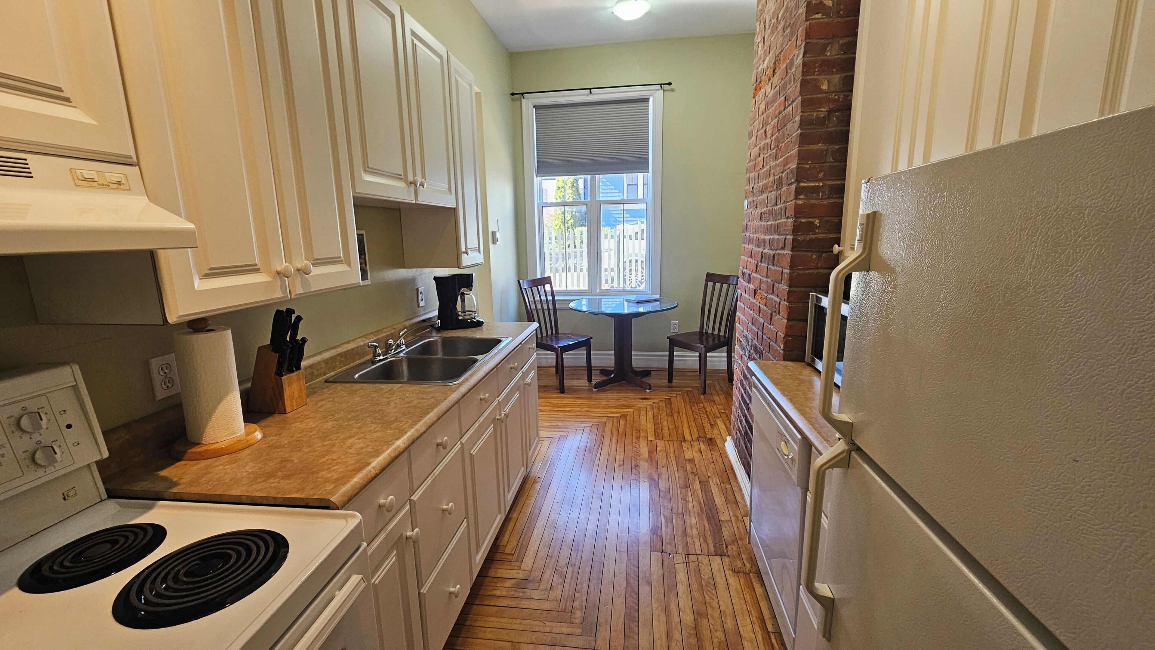 Microwave, coffee/tea maker, cookware/dishes/utensils