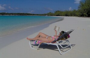 On the beach, sun loungers, beach towels