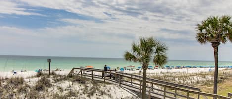 On the beach, sun loungers, beach towels