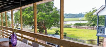 Classic Pawleys. Just Renovated. Long, breezy porches. Steps to beach and creek.