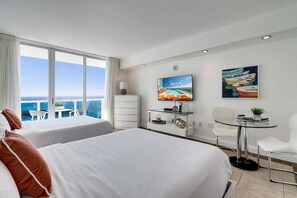 1 bedroom, desk, iron/ironing board, travel cot