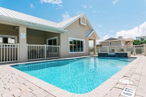 Outdoor pool, a heated pool, sun loungers