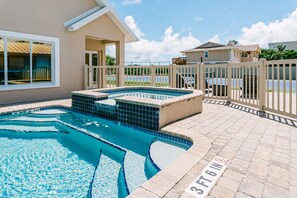 Outdoor pool, a heated pool, sun loungers