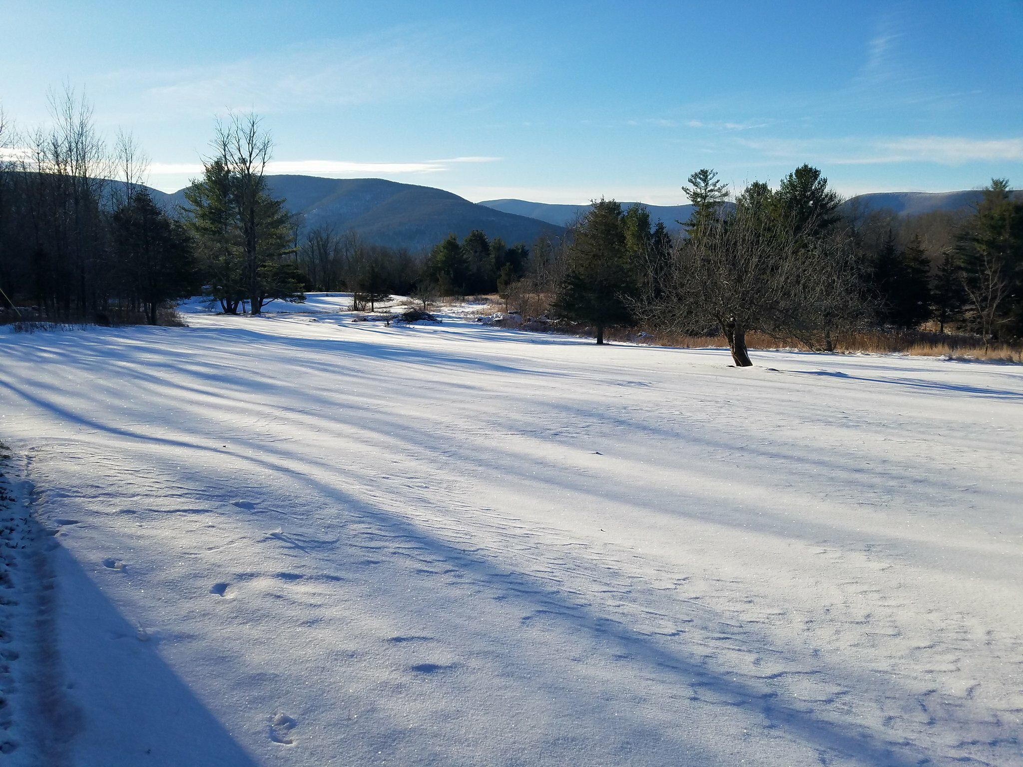 Our backyard In winter; view of mountains and frozen pond!!!