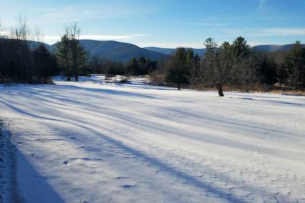 Our backyard In winter; view of mountains and frozen pond!!!