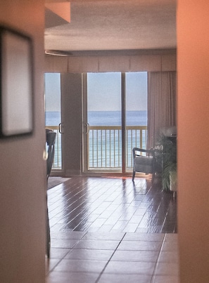 Enjoy the serene view of the water from the balcony with a sliding glass door.