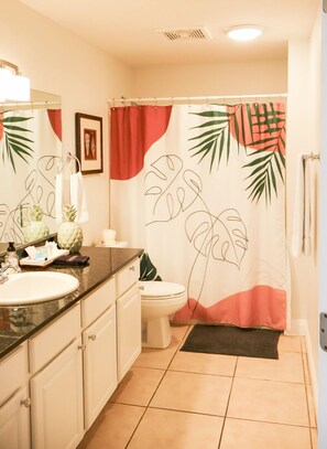Combined shower/bathtub, hair dryer, towels, soap - Calypso Resort~Beachfront 5th Floor Condo~Gulf Front Master~Steps to Pier Park (Panama City Beach)