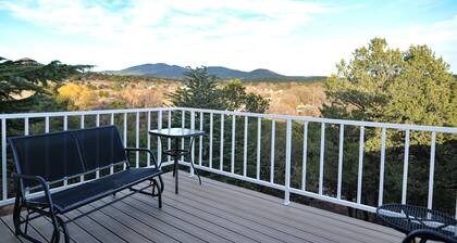 One Cozy BR and a separate Large BR that opens onto a Deck with Mountain views