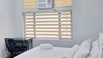 1 bedroom, desk, laptop workspace, iron/ironing board