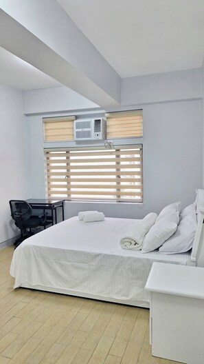 1 bedroom, desk, laptop workspace, iron/ironing board