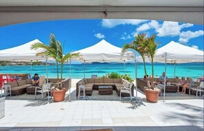 Terrace/patio - Island Time Sapphire Beach, Beach level walkout, Bldg A , Backup Generator. (St Thomas)