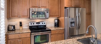 PGA National Home on Squire Golf Course 180º Water Views by Guaranteed Rental™