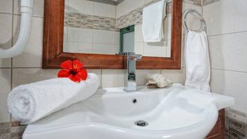 Hair dryer, towels, toilet paper