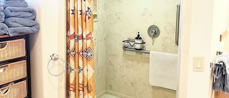 Shower, hair dryer, towels, soap