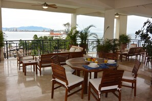 Outdoor dining - Beachfront Panoramic Oceanview Modern Luxury (Old Town Romantic Zone) (Puerto Vallarta)