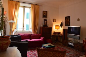 Flat-screen TV, video library, stereo