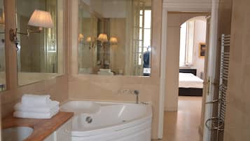 Combined shower/bathtub, jetted bath, hair dryer, bidet
