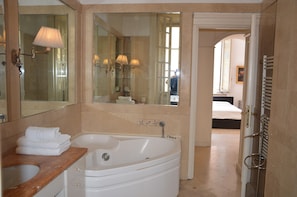 Combined shower/tub, jetted tub, hair dryer, bidet