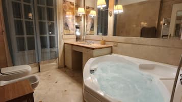 Combined shower/tub, jetted tub, hair dryer, bidet