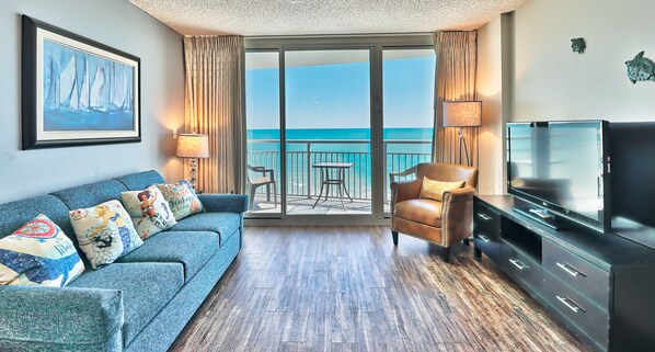 LCD TV, fireplace, DVD player, books