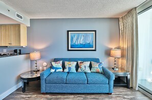 LCD TV, fireplace, DVD player, books