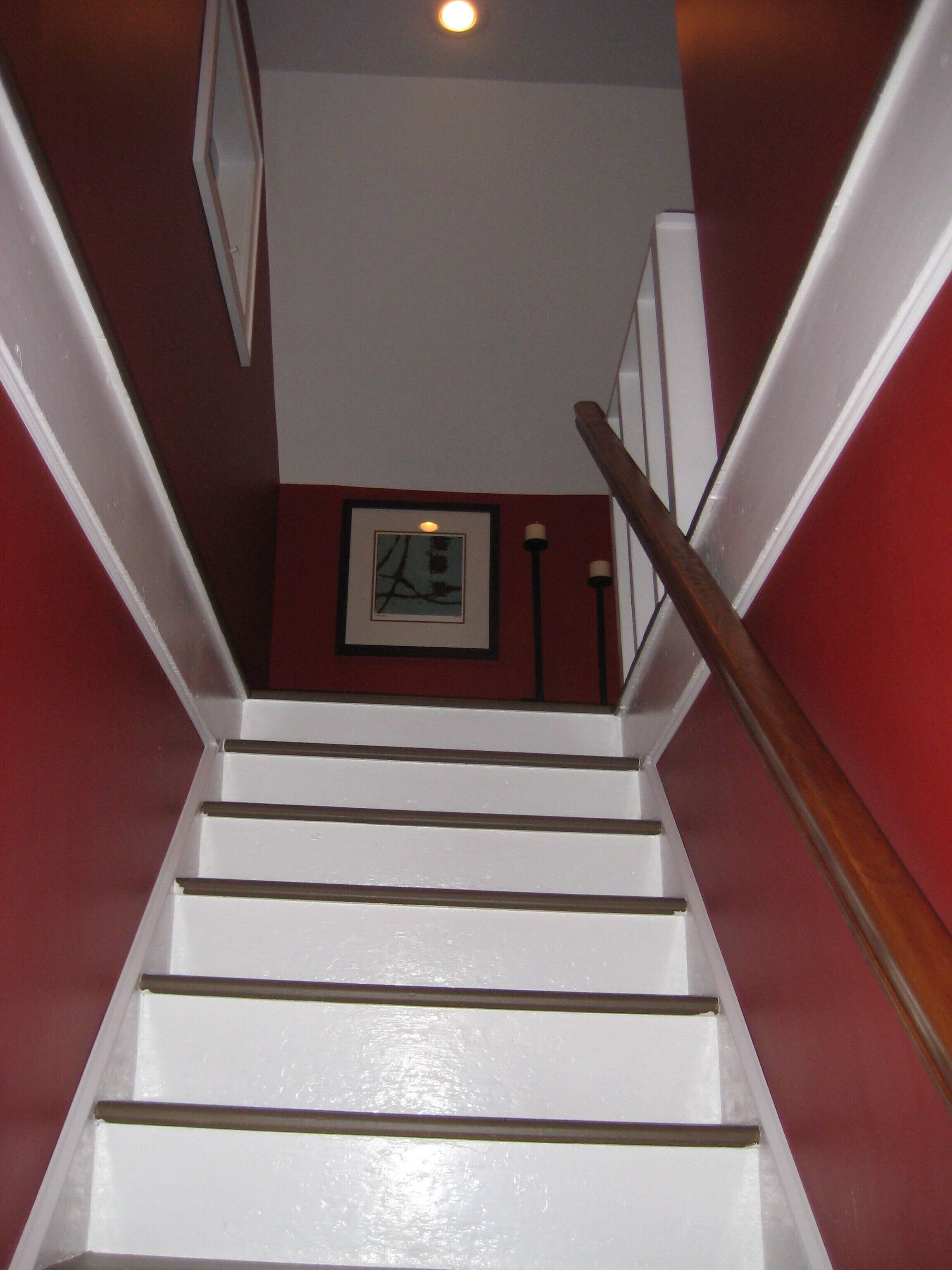 Stairwell with hemlock wide plank floors.