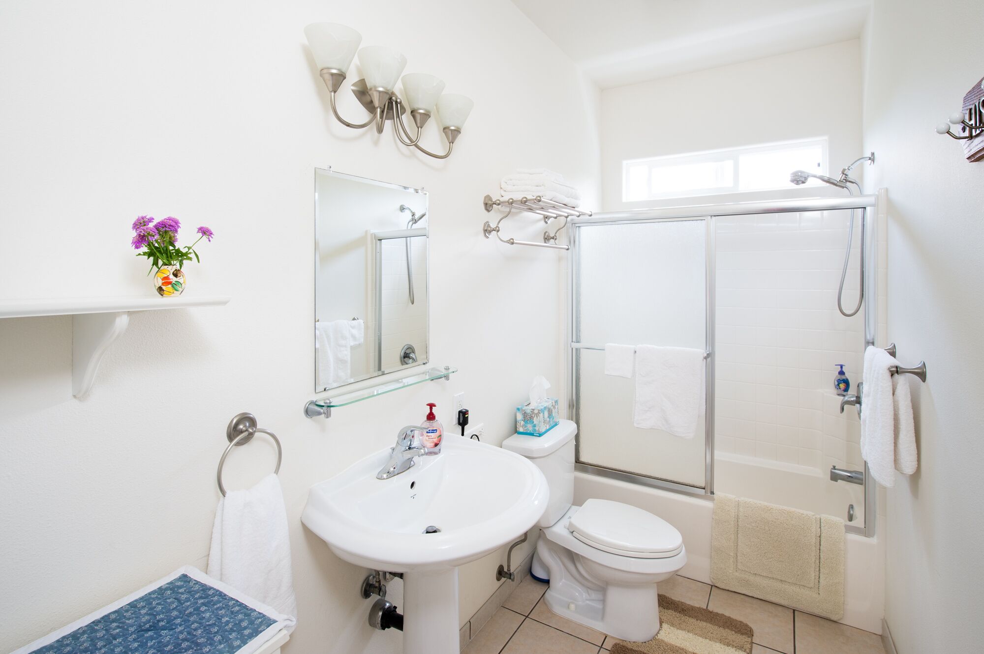 Combined shower/tub, hair dryer, towels, soap