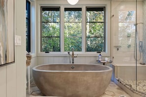Combined shower/tub, hair dryer, towels, soap