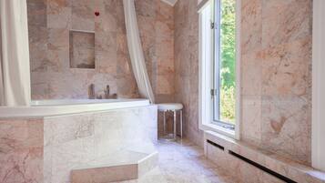 Combined shower/tub, hair dryer, towels, soap